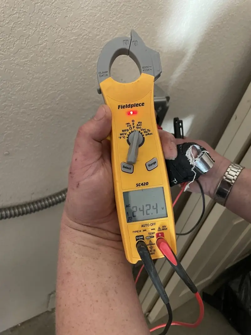 Voltage testing with clamp meter during Aluminum Wiring Replacement in Tucson